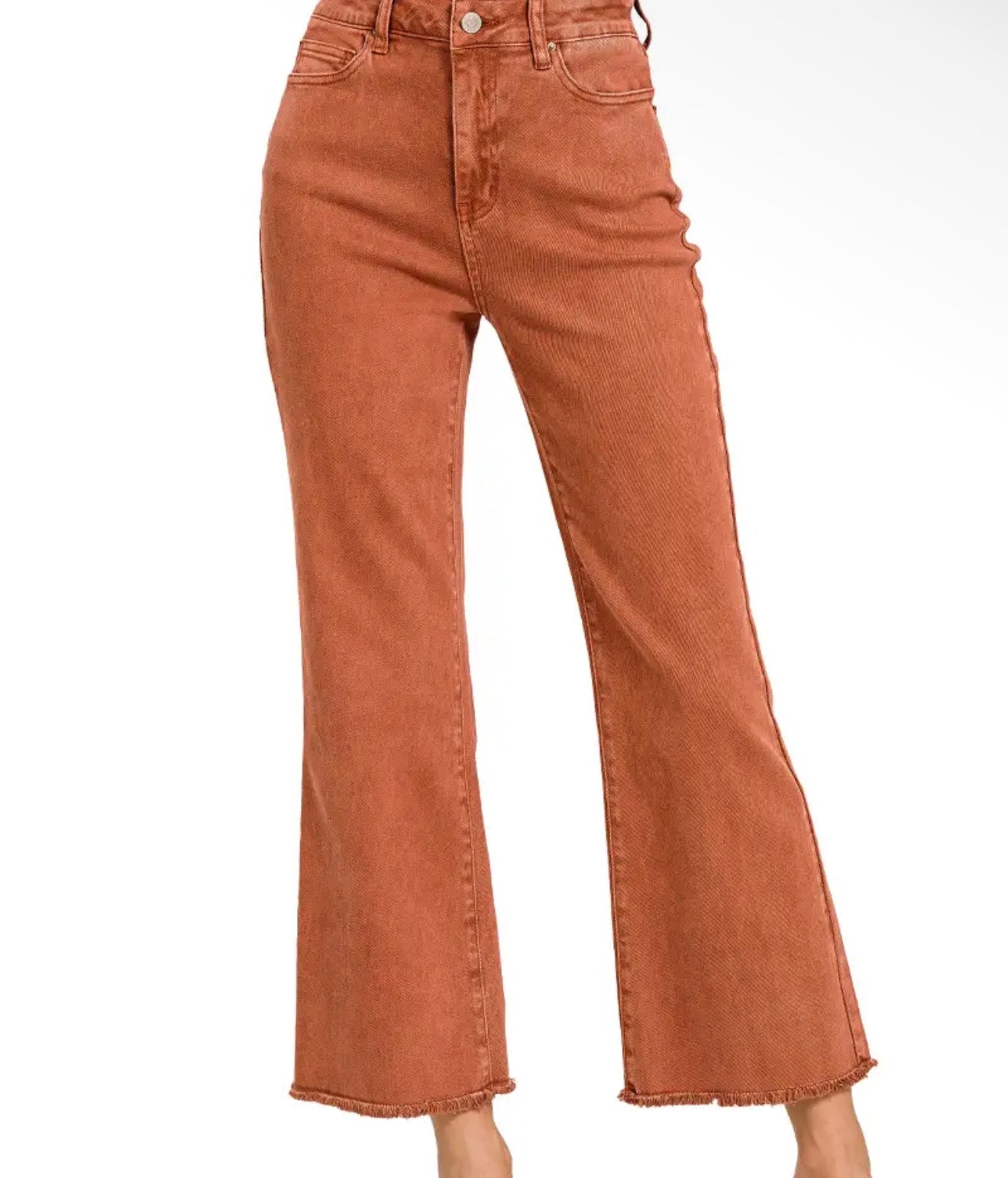 Rust frayed jeans