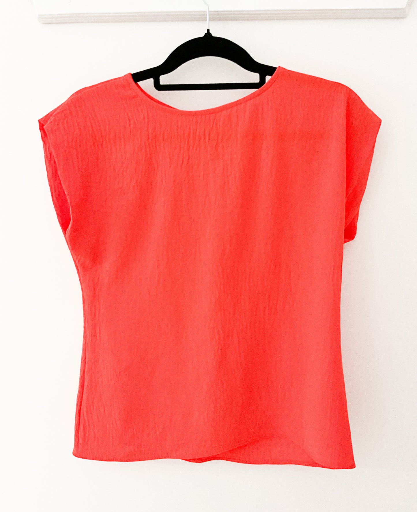 Cap sleeved orange blouse