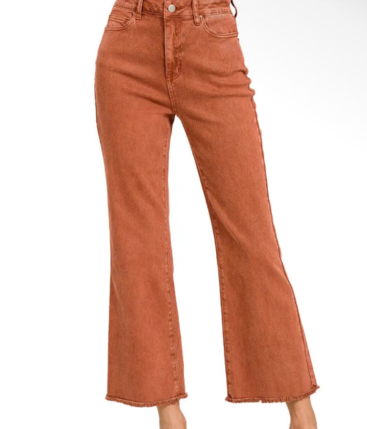 Rust frayed jeans