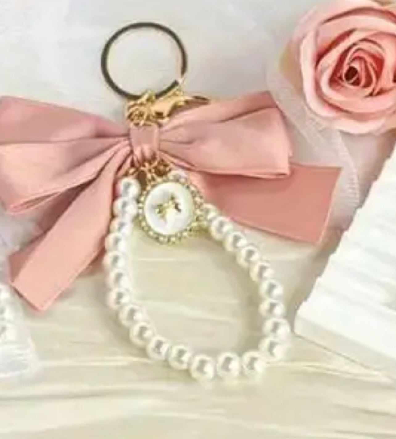 Pearl bow purse chain