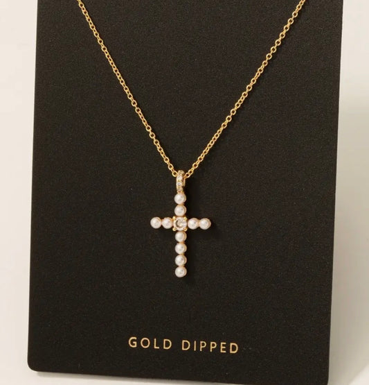 Gold pearl cross neck