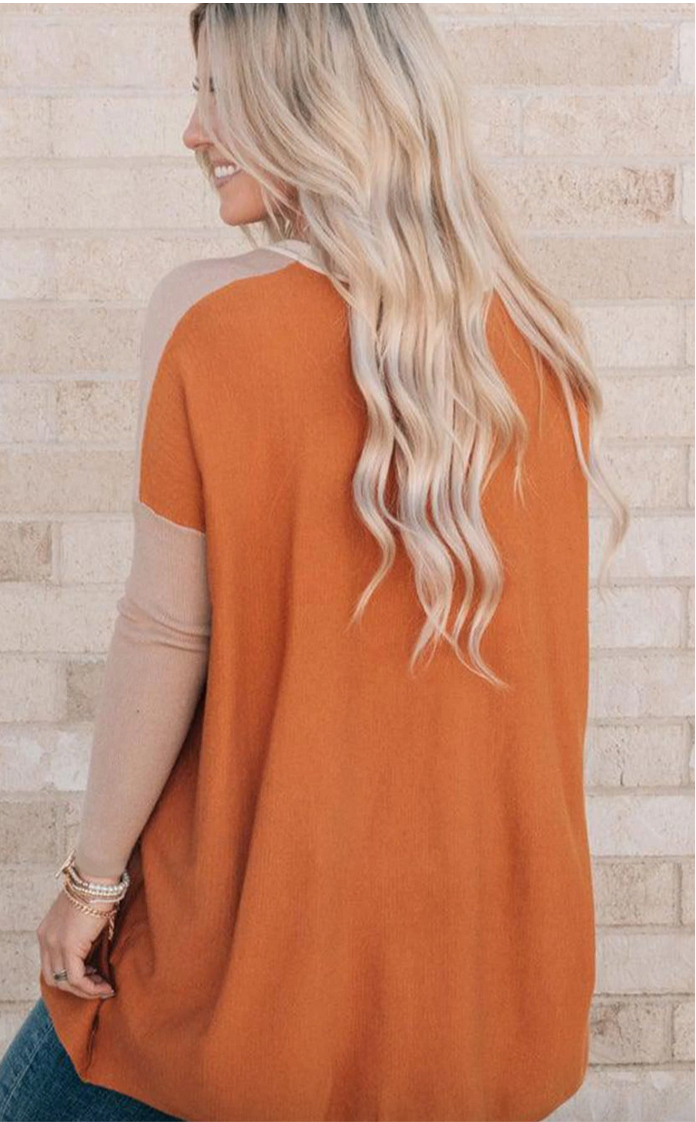 Orange/cream color block top